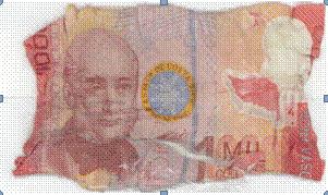 Partially mutilated ₡1,000 banknote with missing sections and damaged edges.