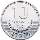Obverse of a silver-colored ten-colón coin issued by the Central Bank of Costa Rica. The numeral “10” appears at the top, followed by the word “COLONES.” In the lower section, the acronym “B.C.C.R.” is displayed, accompanied by two laurel branches extending outward on each side over a background of raised horizontal lines. The coin features a circular shape, a silver-colored finish, and a border decorated with raised dots.