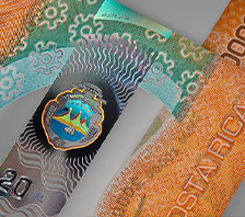 Close-up of a Costa Rican banknote displaying advanced security features used to verify its authenticity and prevent counterfeiting.