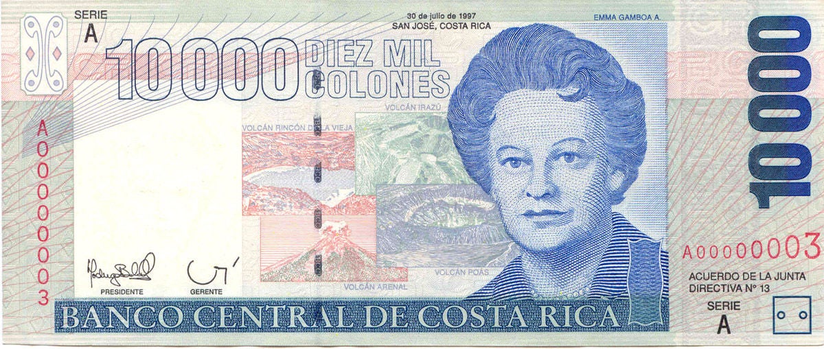 Billete de ₡10.000 del Banco Central de Costa Rica con el retrato de Emma Gamboa Alvarado y representaciones del volcán Poás y paisajes naturales de Costa Rica.